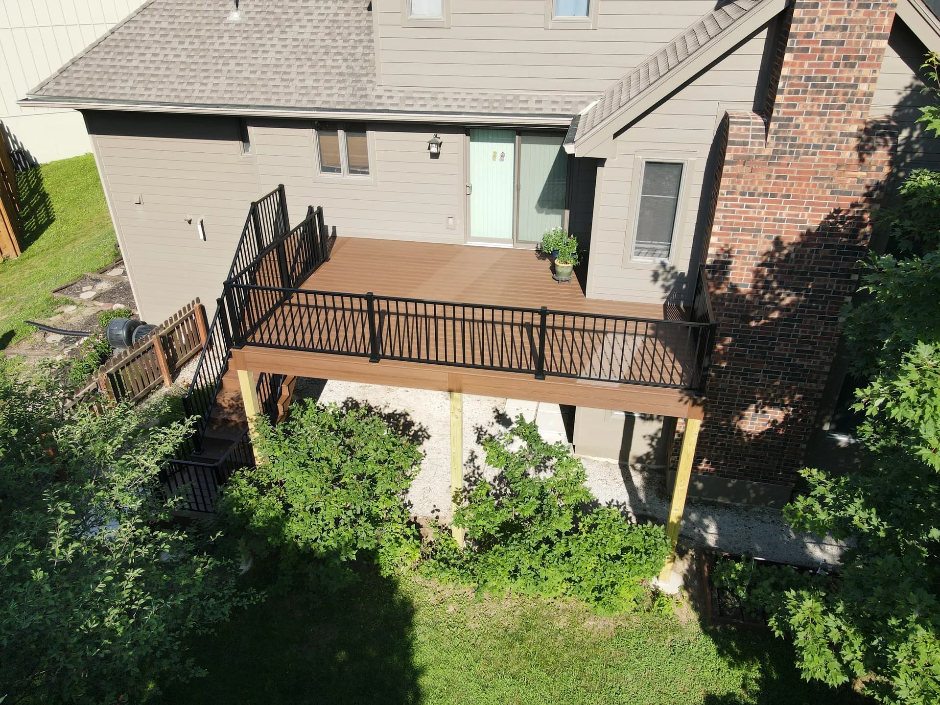 Composite deck and stair package built in a newer Forney, TX subdivision by i30 Builders