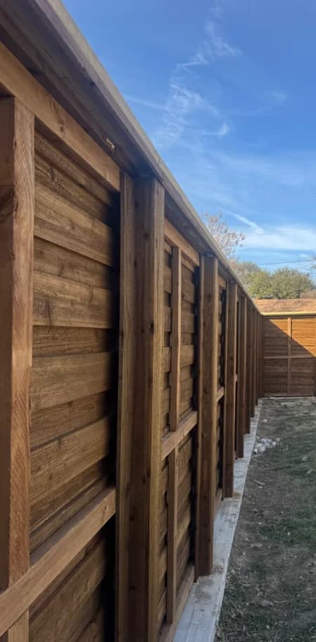 Cedar privacy fence installation by i30 Builders in North Texas