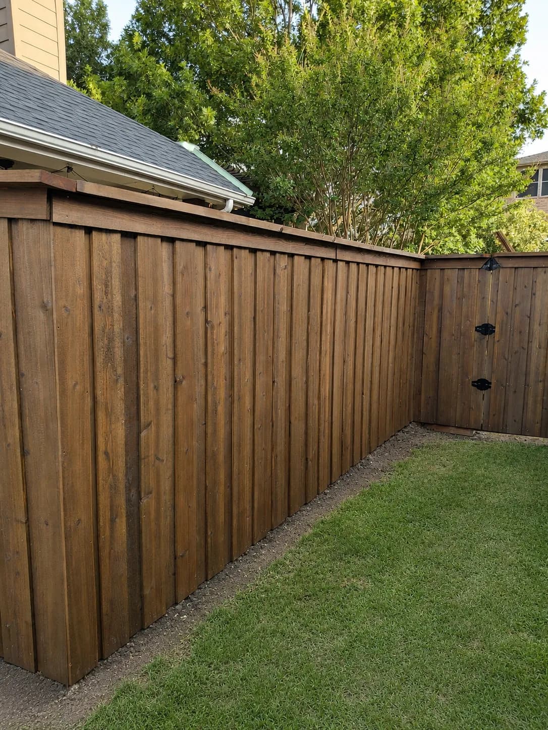 Cedar privacy fence and ranch line on a larger Hunt County lot in Caddo Mills, TX by i30 Builders
