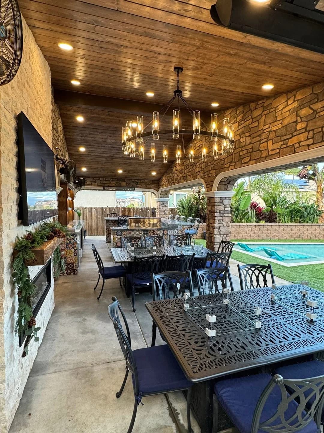 Cedar patio cover over a backyard in an established Plano, TX neighborhood by i30 Builders