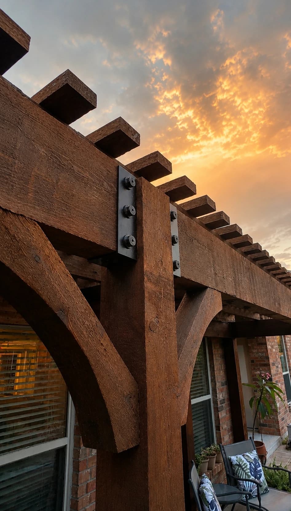 Heavy-timber cedar pergola with steel bracket