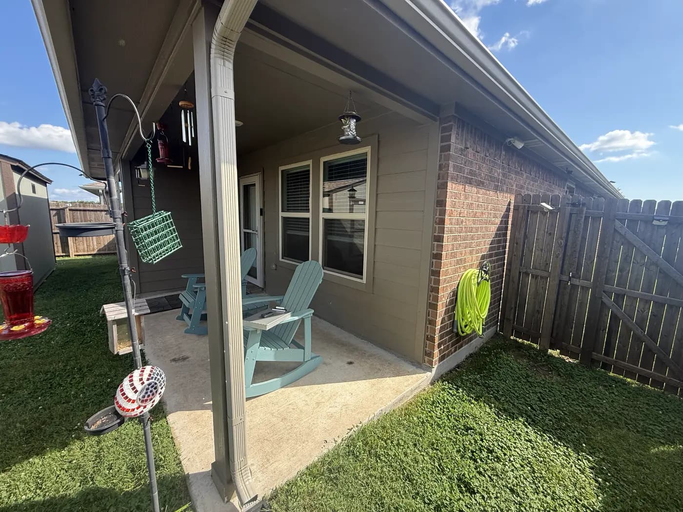 Before: the open covered patio at the back of the Crandall house.